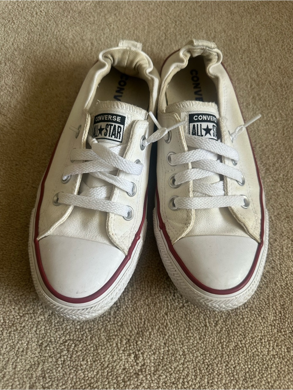 Converse women’s White Canvas Low-Top Sneakers with Red Stripe